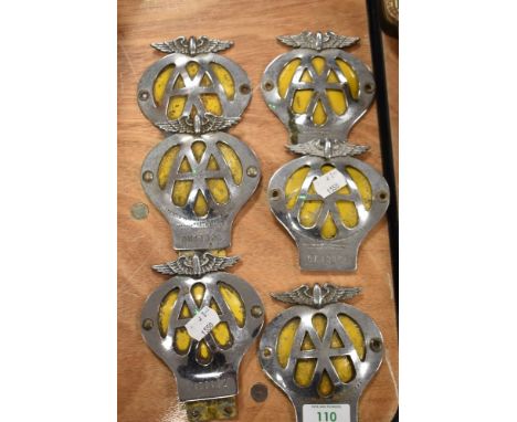 Six collectable vintage AA membership car badges.