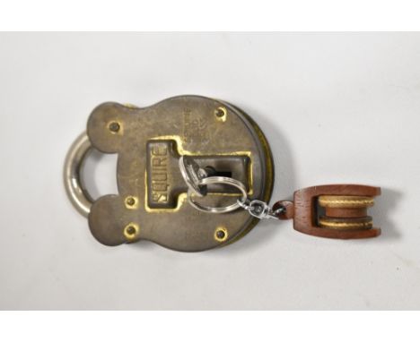 A large vintage brass Squire pad lock, with key.