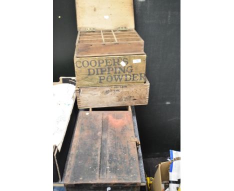 A collection of boxes and crates, including Coopers dipping powder advertising crate and metal ammunition box.
