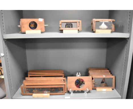 A large collection of Victorian magic lantern slides/ plates, of novelty interest, also included is a kaleidoscopic plate.