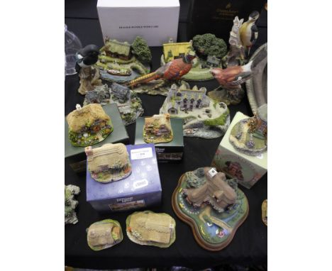 A lot to include a selection of Lilliput Lane collectible ornaments and a variety of ceramic bird figures.