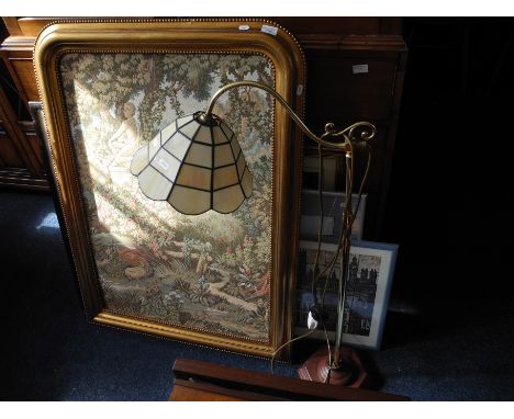 A teak two tier adjustable tea trolley together with a brass standard lamp and a selection of pictures.