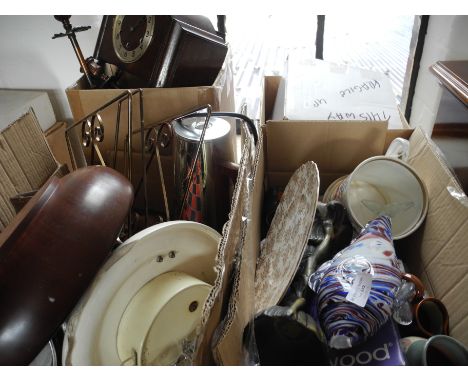 Four boxes containing a quantity of mixed items to include wooden bowl, glass fish and a mantle clock, etc.