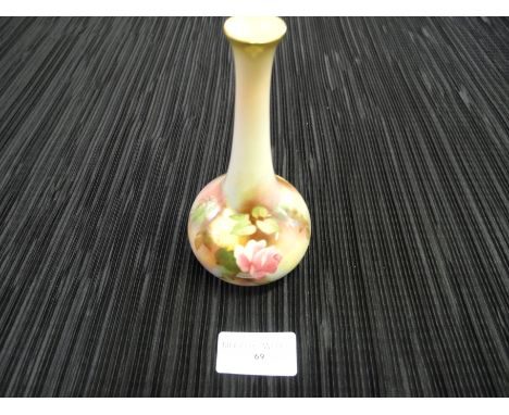 A Royal Worcester rose decorated small vase.