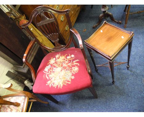 A mahogany armchair with tapestry seat together with a Victorian hall table.