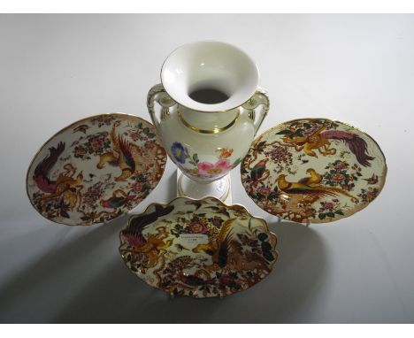 A German floral ceramic vase together with three Royal Crown Derby plates.