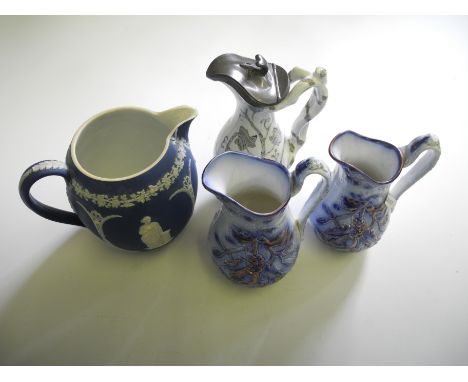A selection of ceramic jugs to include Wedgewood water jug.