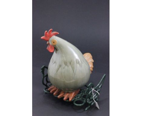 Metal egg stand & a ceramic chicken