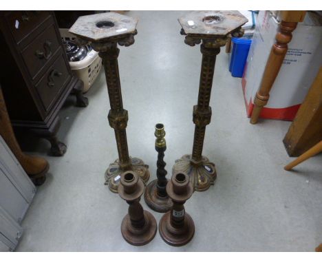 Pair of Gilt Wooden Candlestands, Pair Oak Candlesticks and another Candlestick