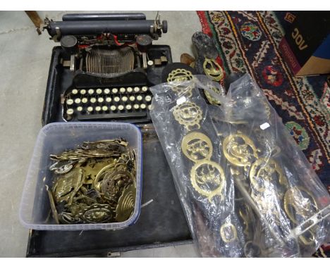 Quantity of Horse Brasses, some on leather straps plus a Corona Portable Typewriter