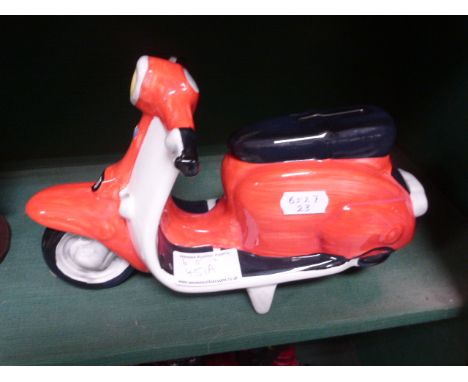 Novelty money box in the form of a Lambretta scooter