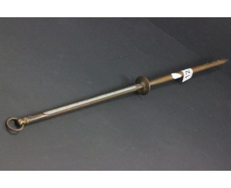 An early 20th century thermometer in a copper surround 