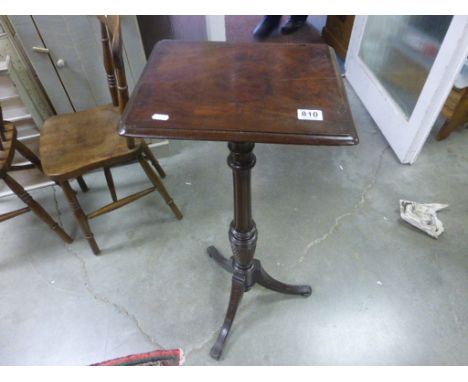 19C Mahogany torchere stand with oblong top over a turned column and tripod base