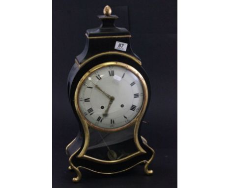 A 19th century French black and gilt  mantle clock, with a white enamel dial and eight day movement 