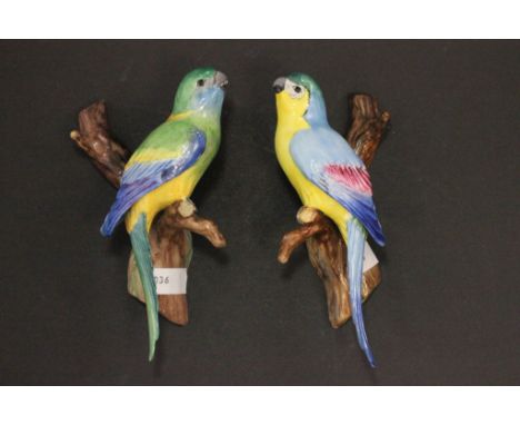 A pair of Royal Crown ceramic wall birds 