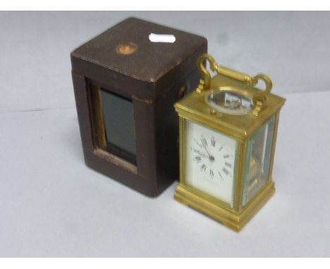 19th century brass travel Carriage clock with striking function in original leather travel case Geo Edward & Sons
