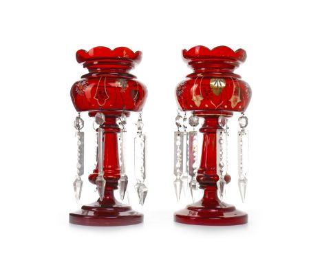 PAIR OF VICTORIAN RUBY GLASS LUSTRESeach with scalloped rim, above a tapering knopped stem, and a spreading base, enamel flor