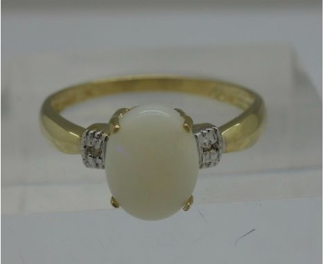 A 9ct gold, opal and diamond ring, weight 1.2g, size N