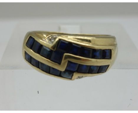 A 9ct gold, diamond and blue stone ring, weight 3.1g, size K