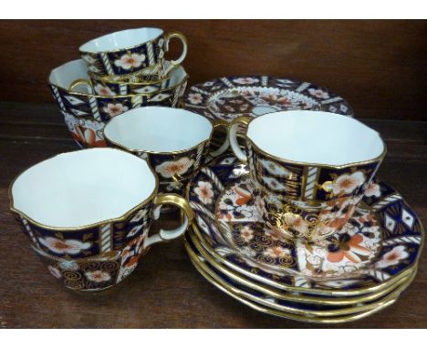 Royal Crown Derby 2451 pattern china comprising five cups, four saucers, five side plates and sugar
