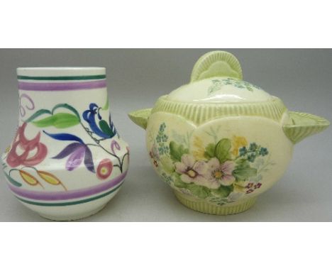 A Clarice Cliff Newport lidded pot, a/f and a Poole vase