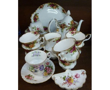 A Royal Albert Old Country Roses six piece tea set with teapot, cream and sugar, etc.