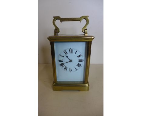 A French brass carriage clock working order, 14cm tall 