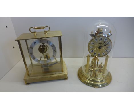 A Kundo Electronic clock in brass case and a Kome anniversary clock, Kundo running in auction, Kome not running 