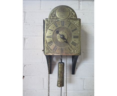 An 18th century bracket alarm wall clock with a 6 inch arched brass dial, signed Thomas Budgen Croydon, with four pillar move