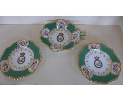 A 19th century Worcester dish and two matching plates with Amorial crest plates, 23cm diameter, some wear mainly to gilt othe