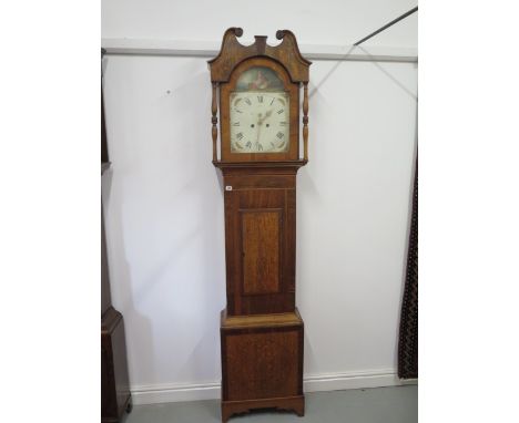 A 19th century oak and mahogany 8 day longcase clock with a painted 13 inch dial with no weights or pendulum, in need of some