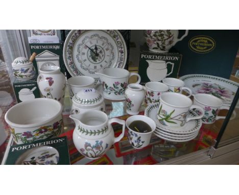 A collection of Portmerian botanic garden including two clocks, serving platters, four cups and saucers, gravy boat, jugs etc