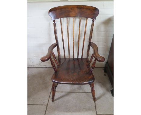 An elm and beech stick back Windsor chair with figured elm seat, back height 104cm, restored condition 