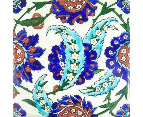 An Iznik pottery tile, 20th century. 20 x 20cm.Very good condition, no cracks or repairs, small chip on one corner.