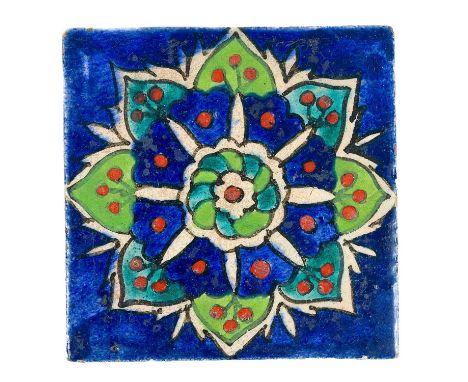 An Iznik pottery tile, 18th/19th century. 11cm square.