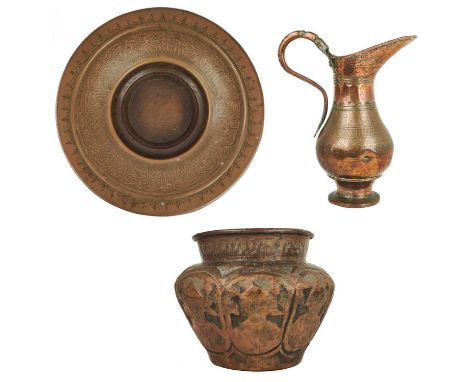 A Persian copper jug, 19th century.  Engraved with geometric motifs, height 28cm, width 22.5cm, depth 12.5cm, a Mamluk Reviva