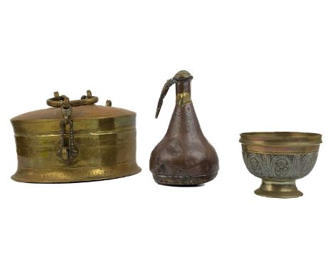 An Indian brass chapati box, circa 1900. Height 10cm, diameter 20cm, an Indian bronze footed bowl, 19th century, height 7.5cm