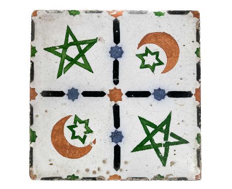 A Middle Eastern tin glazed pottery tile. 19.5 x 19.5cm.
