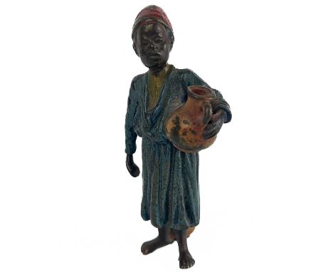 An Austrian cold painted bronze figure of an Arab boy Holding a water jug in left hand, height 9.5cm, width 4cm.