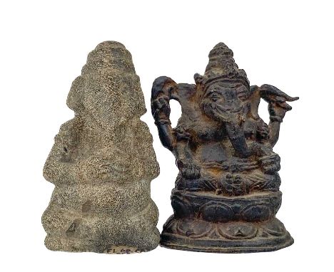 An Indian bronze figure of Ganesh, 19th century. Height 15cm, width 11.5cm, depth 8cm and a stone model of Ganesh, 19th centu