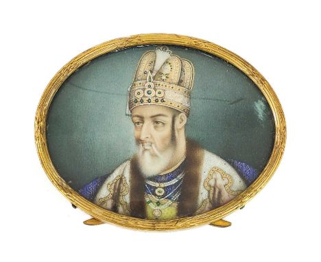 An Indian miniature oval portrait painting of Bahadur Shah Zafar, 19th century.  With a gilt metal fluted frame, 5.5 x 6.5cm.