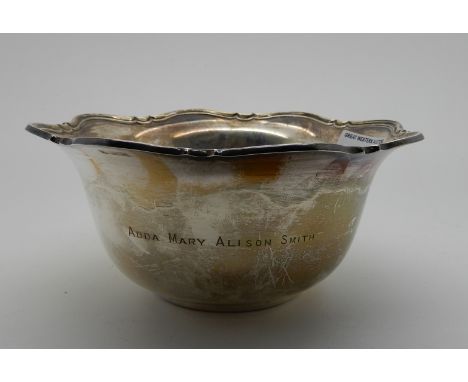 A silver christening bowl, Sheffield 1922, circular with scalloped rim inscribed "Adda Mary Alison Smith" and dated on the ba