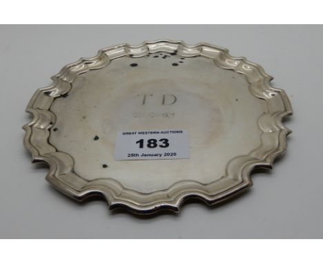 A silver card tray, Sheffield 1992, circular with scalloped rim, monogrammed TD and dated 11-4-'92, 15cm diameter, 113gms Con