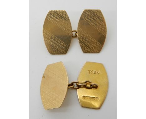A pair of 9ct gold engine turned cufflinks, weight 5.1gms Condition Report: Available upon request