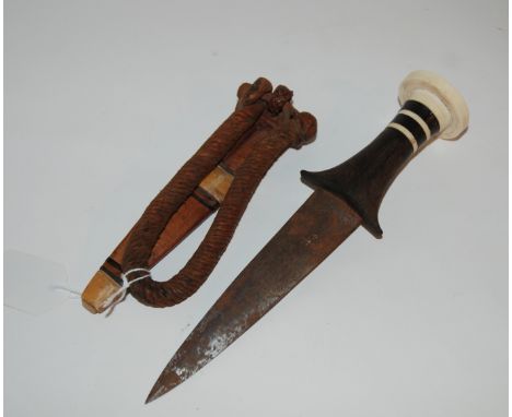 A Sudanese arm dagger in scabbard Condition Report: Available upon request