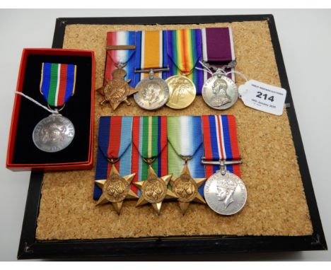 A lot comprising a mounted WWI group of four including a 1914 star and a long service and good conduct medal to 1024492 Sjt. 