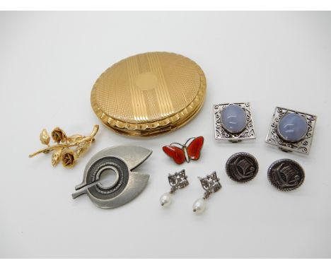 Two Chinese white metal dress clips set with lace agate, a silver and red enamel butterfly brooch by Norwegian designer Aksel