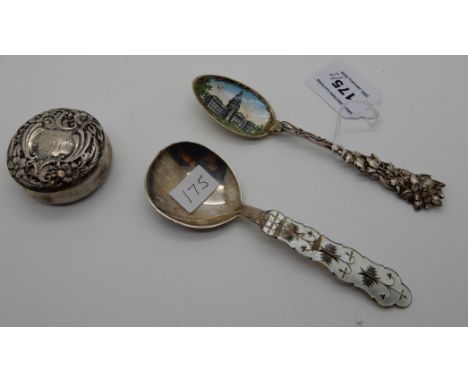 A lot comprising two sterling silver and enamel serving spoons and a sterling silver pill box with embossed decoration (3) Co