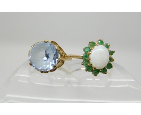 A 9ct gold opal and emerald cluster ring size N/12 and a 9ct blue gem set ring with scroll setting size M1/2, weight combined