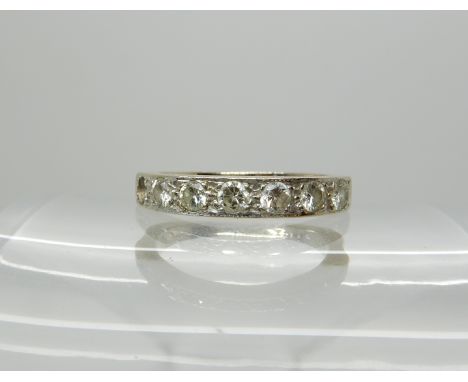 An 18ct white gold seven stone diamond ring (one diamond missing) set with 0.30cts of brilliant cut diamonds size K, weight 3